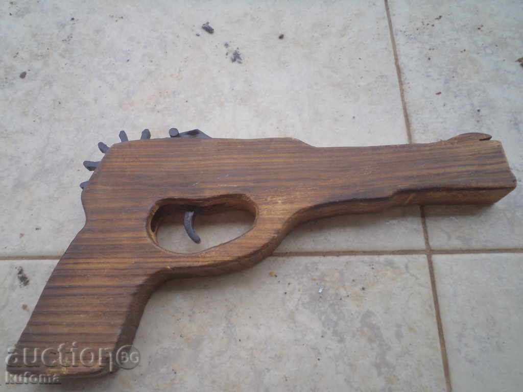 Wooden pistol with price 6.99 BGN | € 3.57 Wooden pistol with price 6.99 BGN | € 3.57