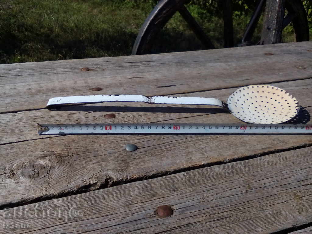 Enamelled slotted spoon