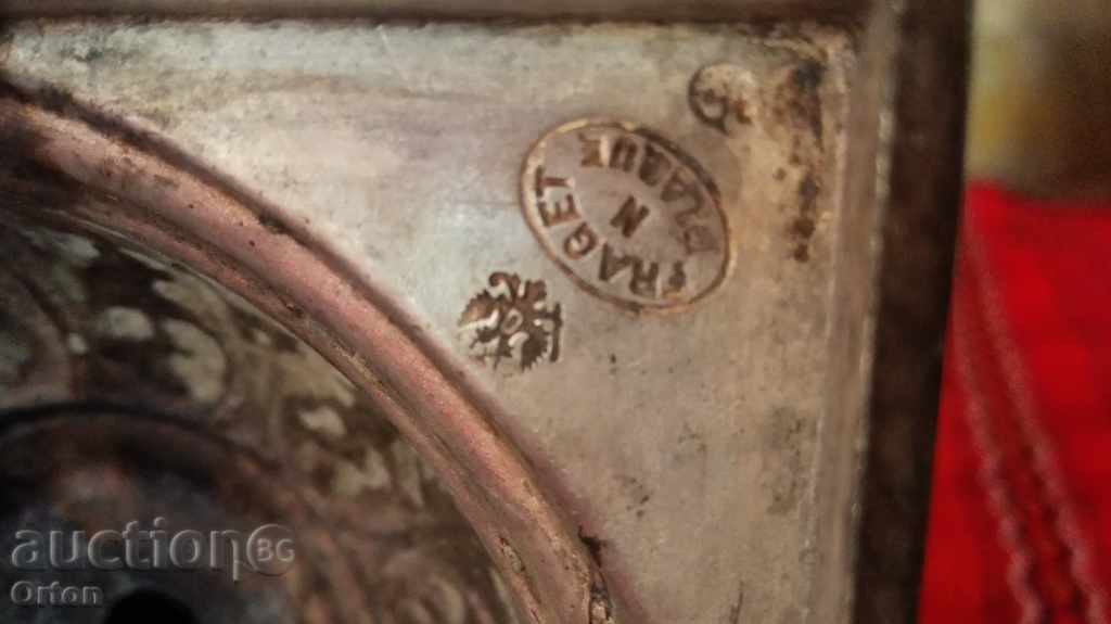 Auction  Old silver candlestick