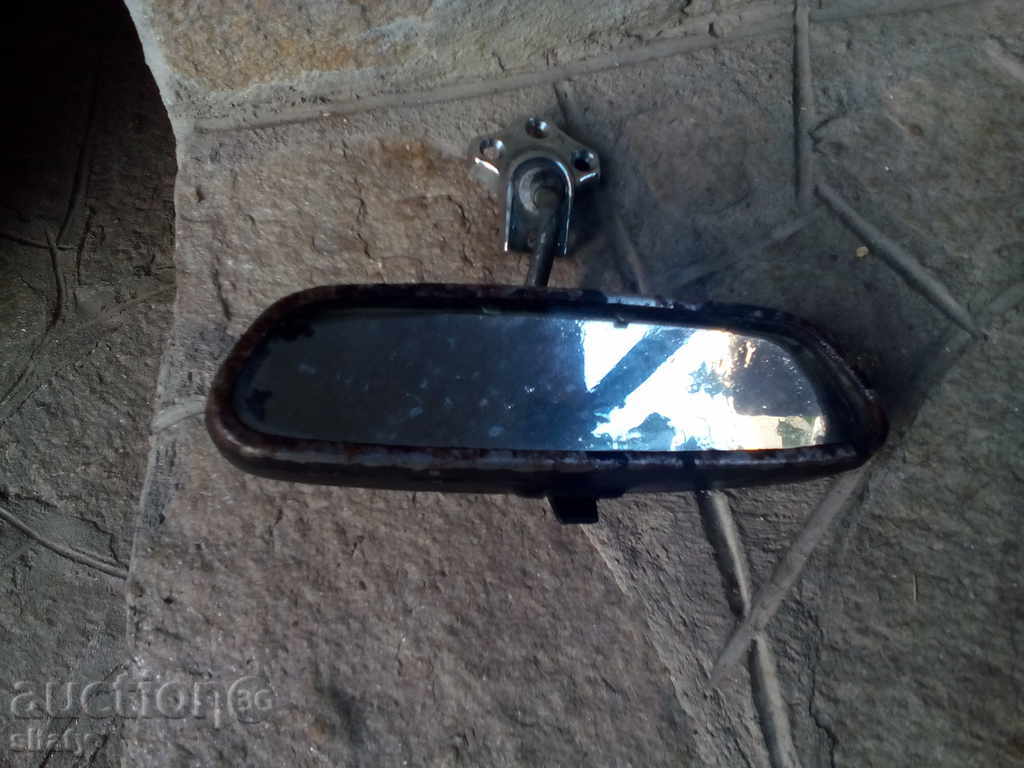 Auction An old car mirror. Auction An old car mirror.
