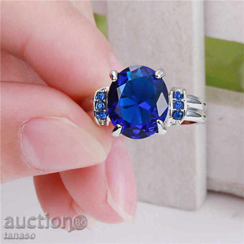 Ring with blue zircons, white rhodium plated with price 25.00 BGN | € 12.78 Ring with blue zircons, white rhodium plated with price 25.00 BGN | € 12.78