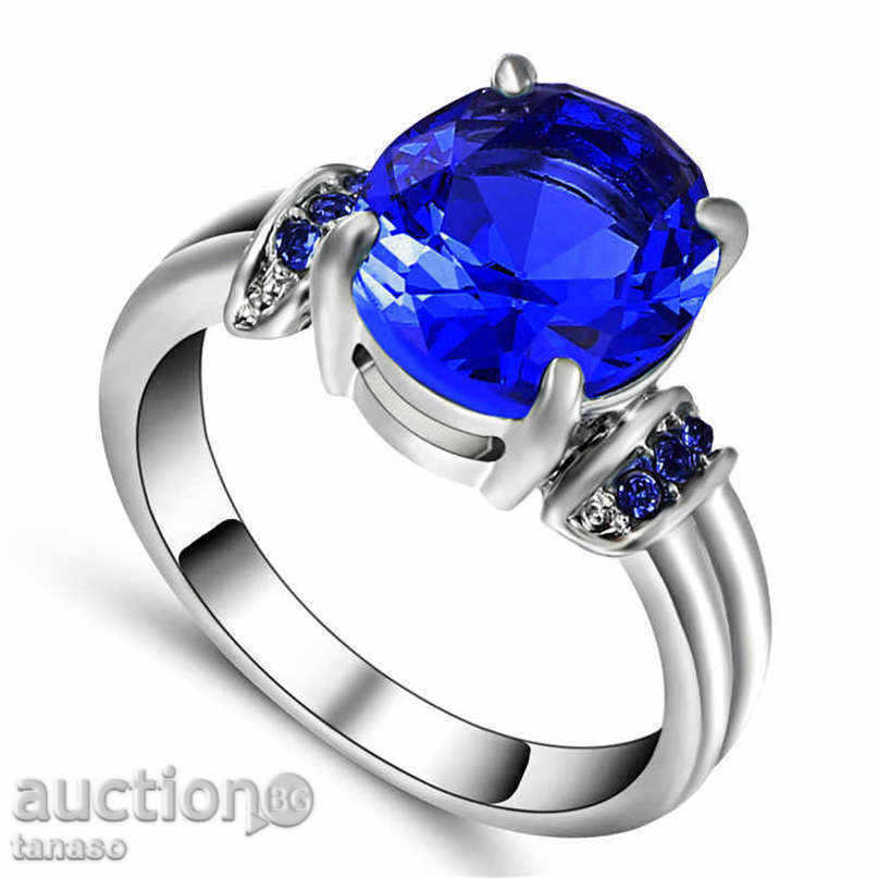 Ring with blue zircons, white rhodium plated