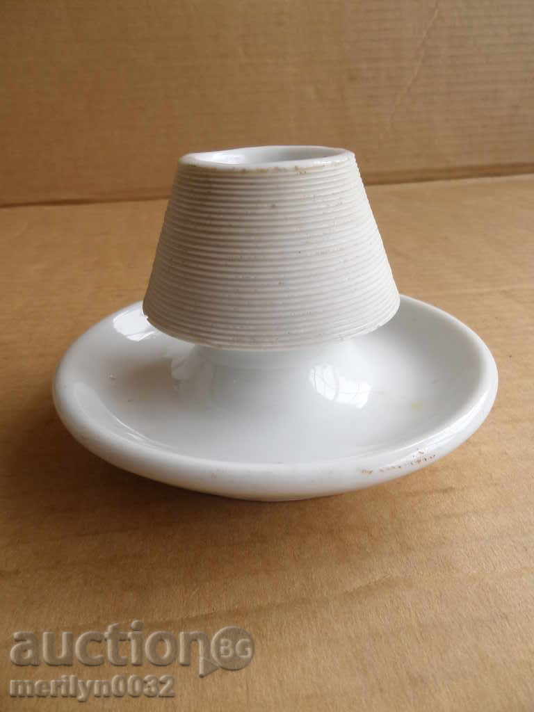 An old porcelain porcelain candlestick