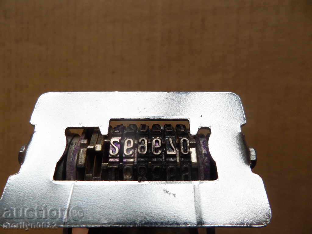 An old stamp with rotating digits - 5 An old stamp with rotating digits - 5