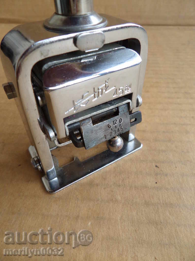 An old stamp with rotating digits - 7 An old stamp with rotating digits - 7