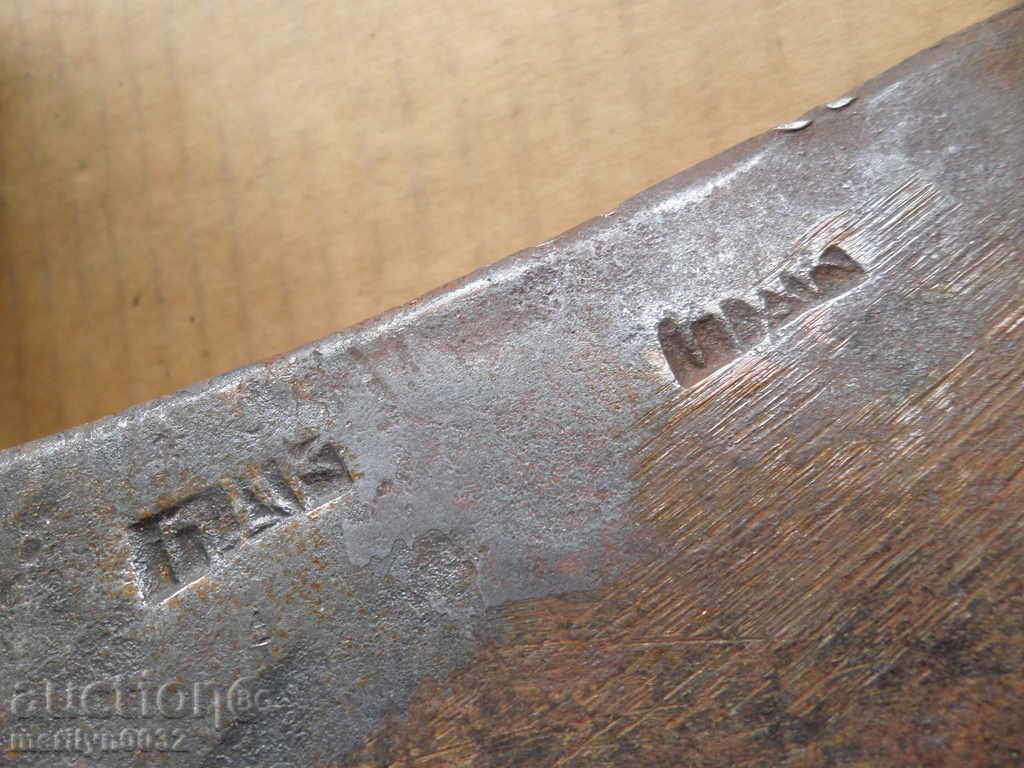 Delivery of Old forged ax with a marker sato top without gauze