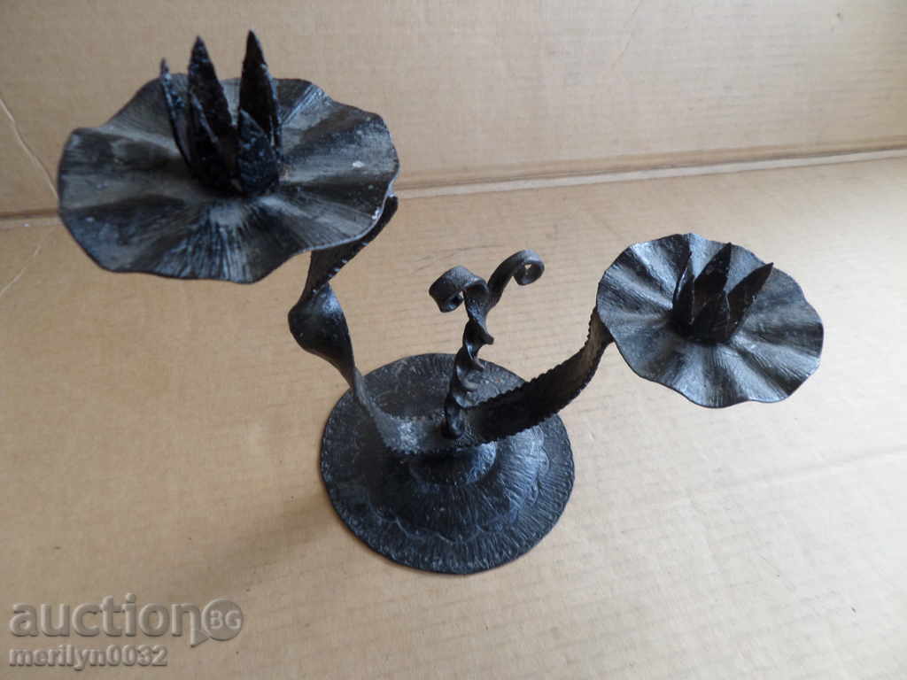 Auction An old candle made of wrought iron lamp Auction An old candle made of wrought iron lamp