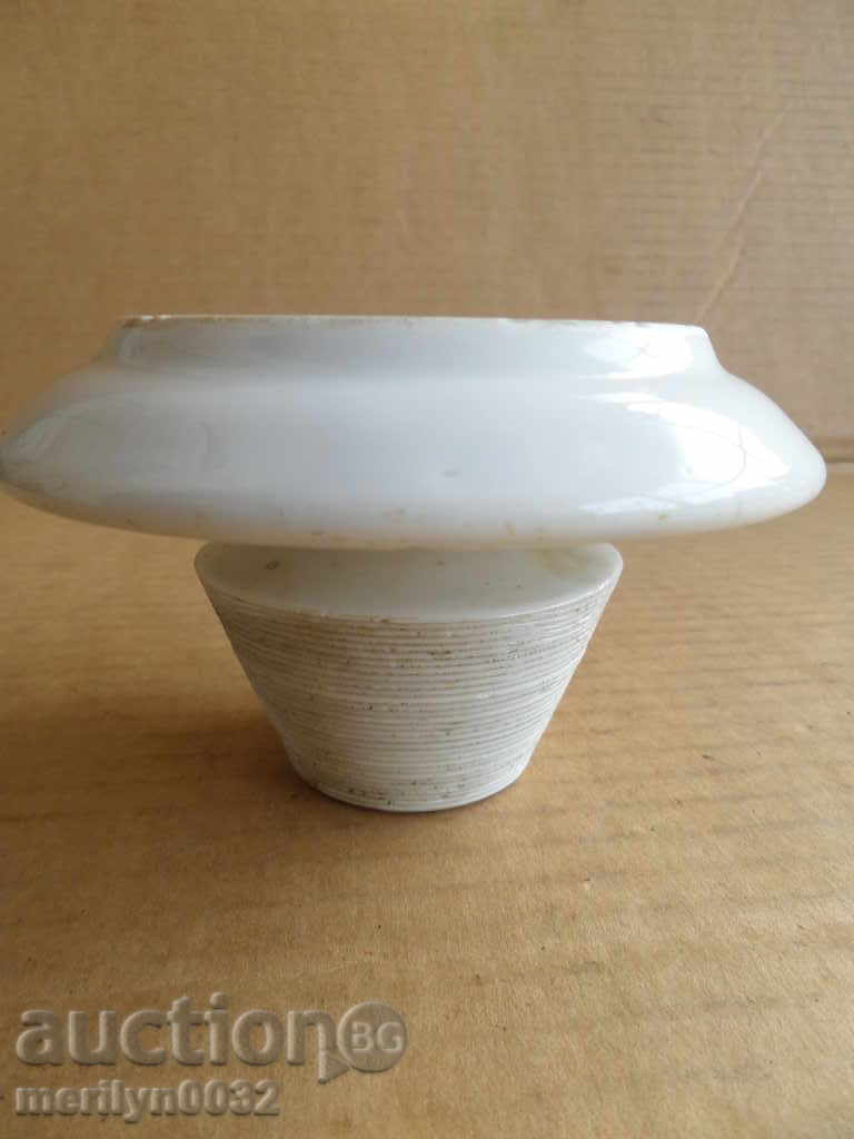 An old porcelain porcelain candlestick with price 39.00 BGN | € 19.94 An old porcelain porcelain candlestick with price 39.00 BGN | € 19.94