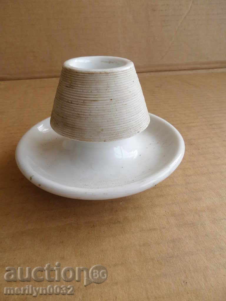 An old porcelain porcelain candlestick