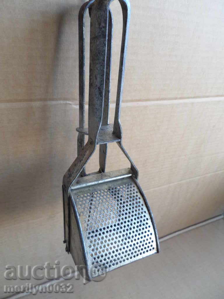 Delivery of An old potato press Delivery of An old potato press