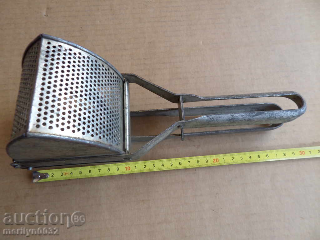 An old potato press - 6 An old potato press - 6