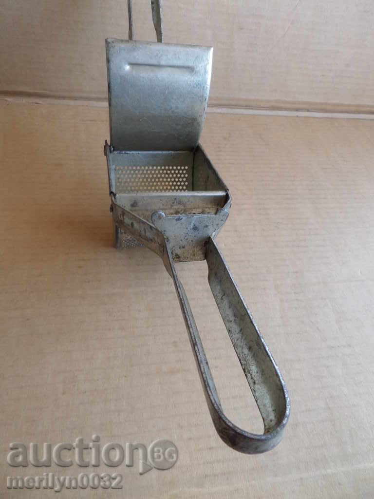 An old potato press - 7 An old potato press - 7