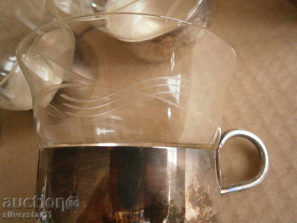 Auction  SIGG SWITZERLAND seamlessly trimmed with engraved glazing