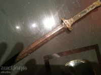 an old unique collectible rare dagger clack sword