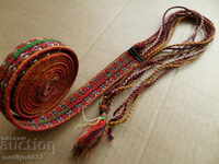 An old hand-woven belt from the beginning of the 20th century wears a length of 2.9 meters