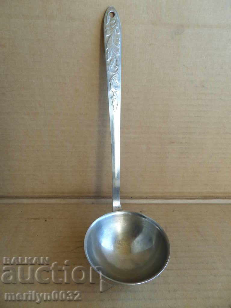 Old spoon of stainless steel, labeled wound coat, Bulgaria