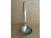 Old spoon of stainless steel, labeled wound coat, Bulgaria