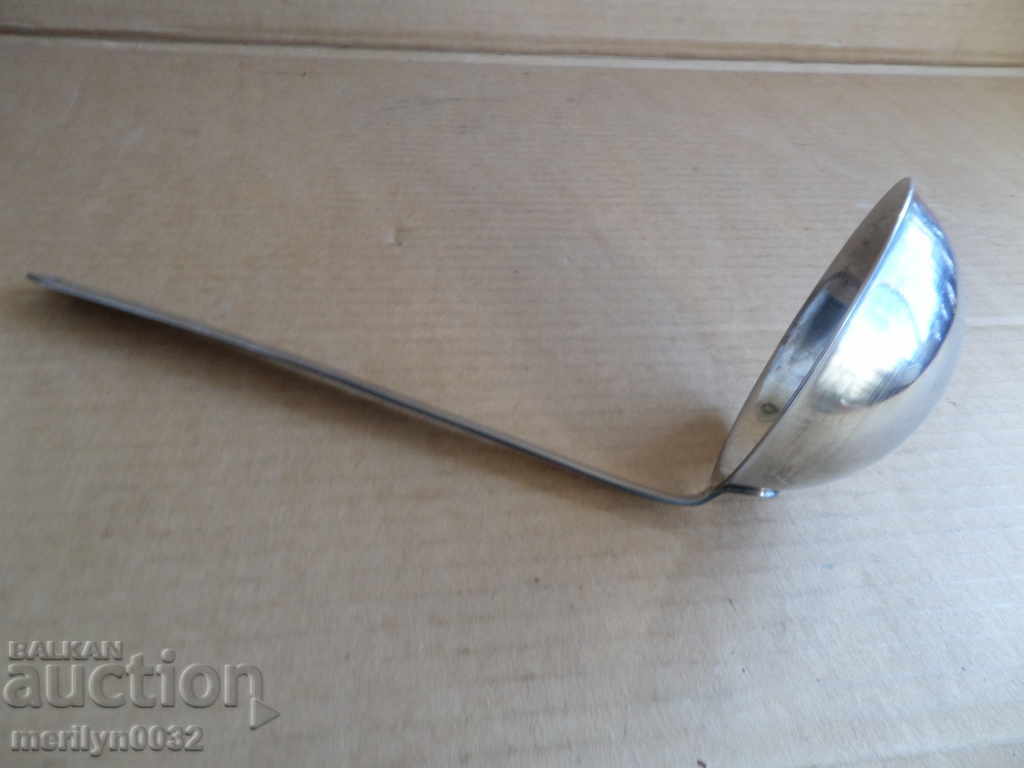 Old spoon of stainless steel, labeled wound coat, Bulgaria Old spoon of stainless steel, labeled wound coat, Bulgaria