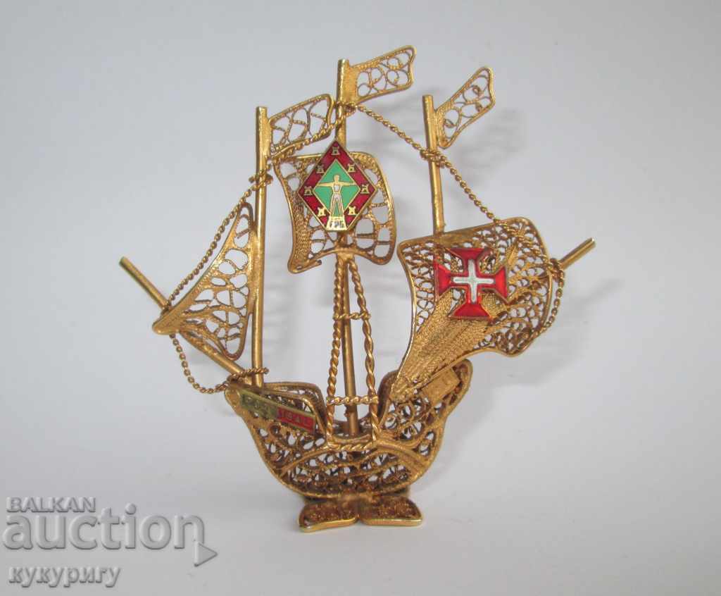 Delivery of a small canvas ship with a gold-plated hand-made filigree Delivery of a small canvas ship with a gold-plated hand-made filigree