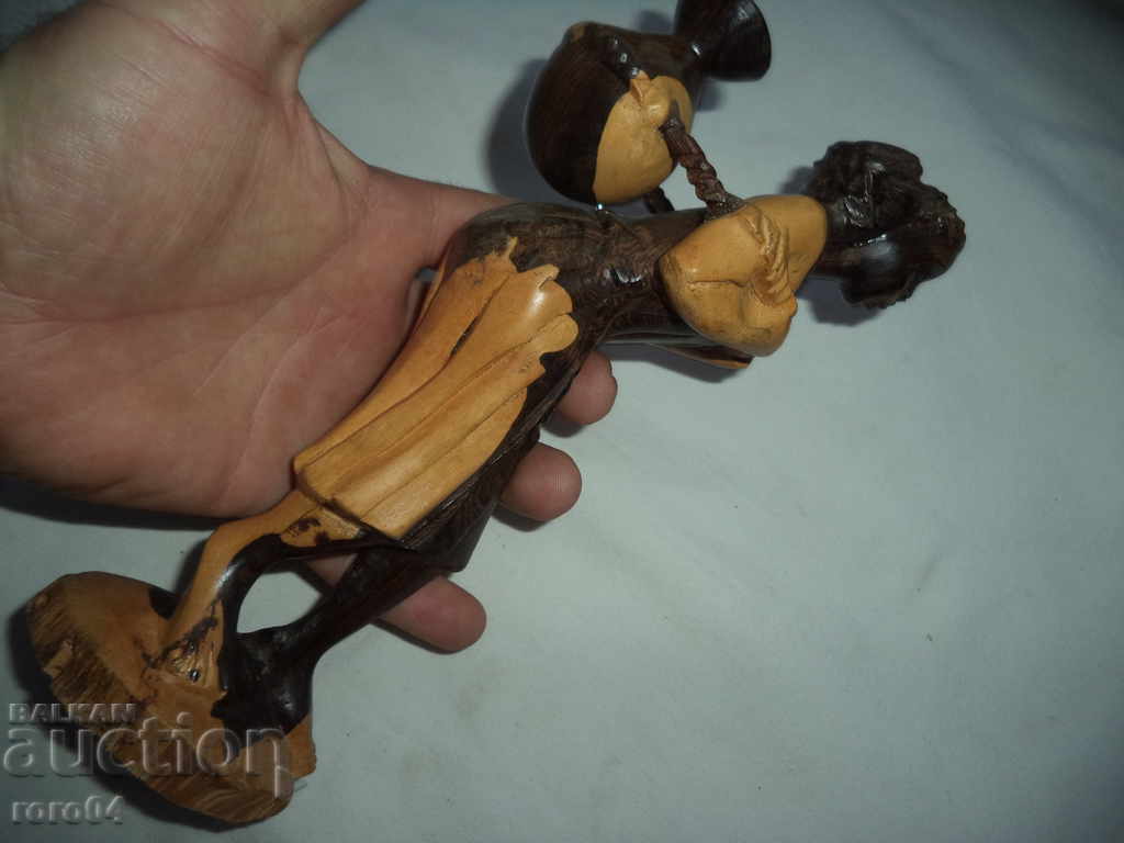 Auction  OLD AFRICAN WOOD STATE