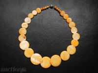 Necklace with natural mother of pearl in orange