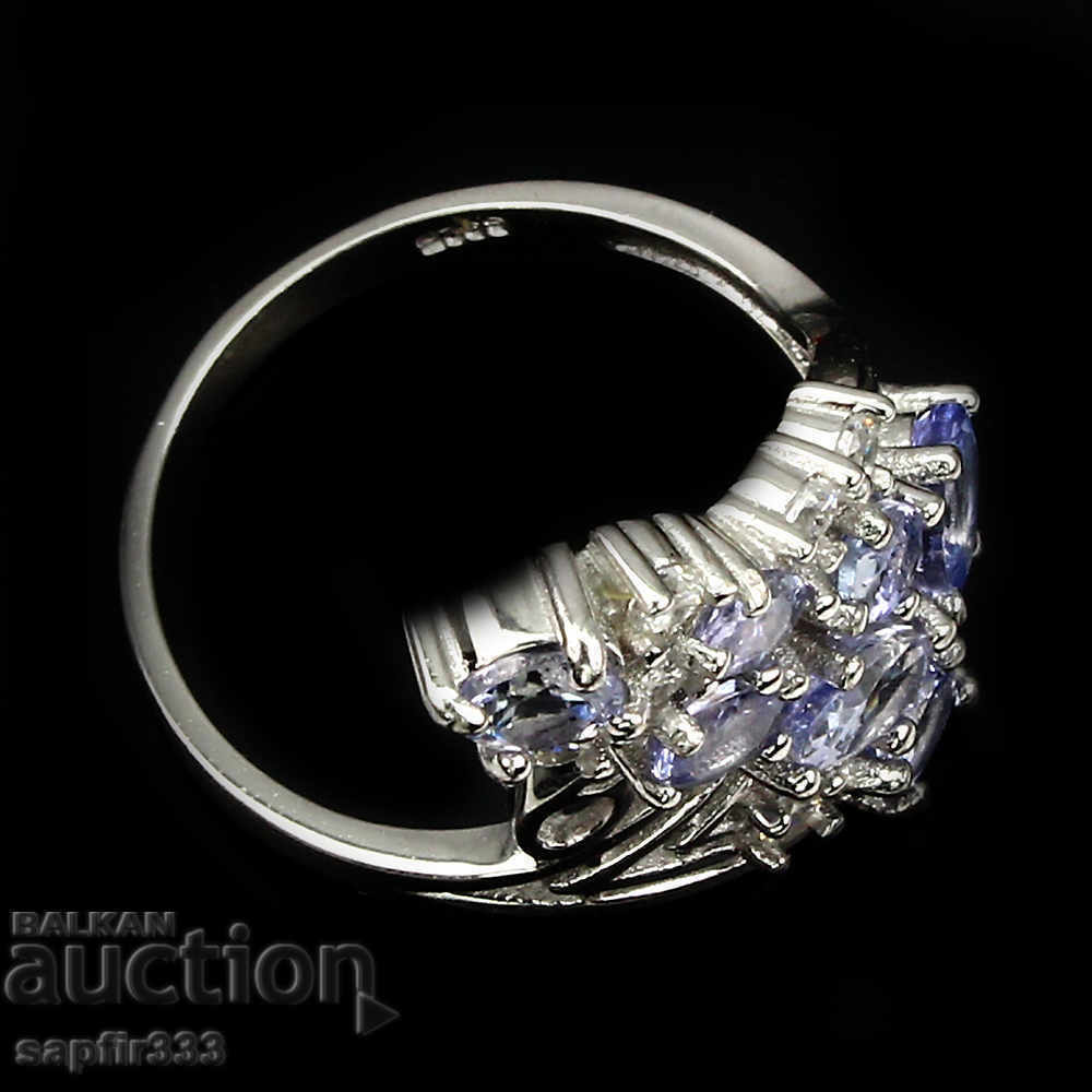 Auction SILVER RING WITH NATURAL TANZANITES AND ZIRCONIA Auction SILVER RING WITH NATURAL TANZANITES AND ZIRCONIA