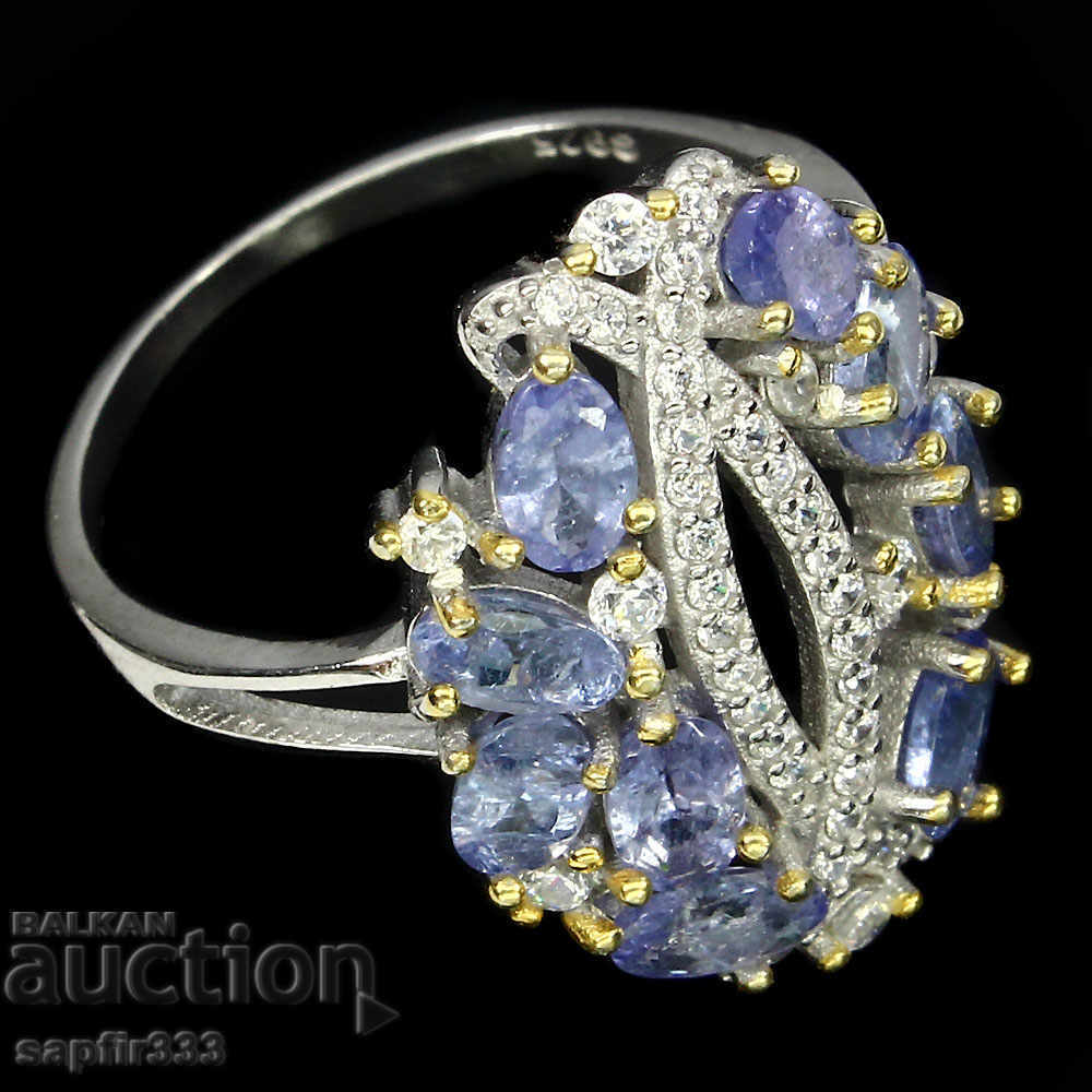 Auction UNIQUE RING WITH NATURAL TANZANITIS AND CYCLONS Auction UNIQUE RING WITH NATURAL TANZANITIS AND CYCLONS