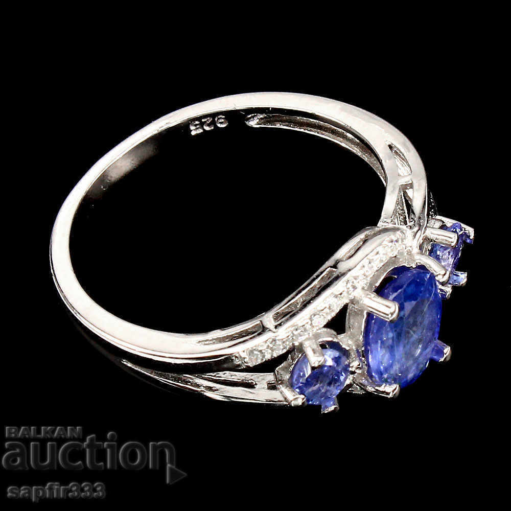 Auction ELEGANT SILVER RING WITH NATURAL TANZANITES AND ZIRCONIA Auction ELEGANT SILVER RING WITH NATURAL TANZANITES AND ZIRCONIA