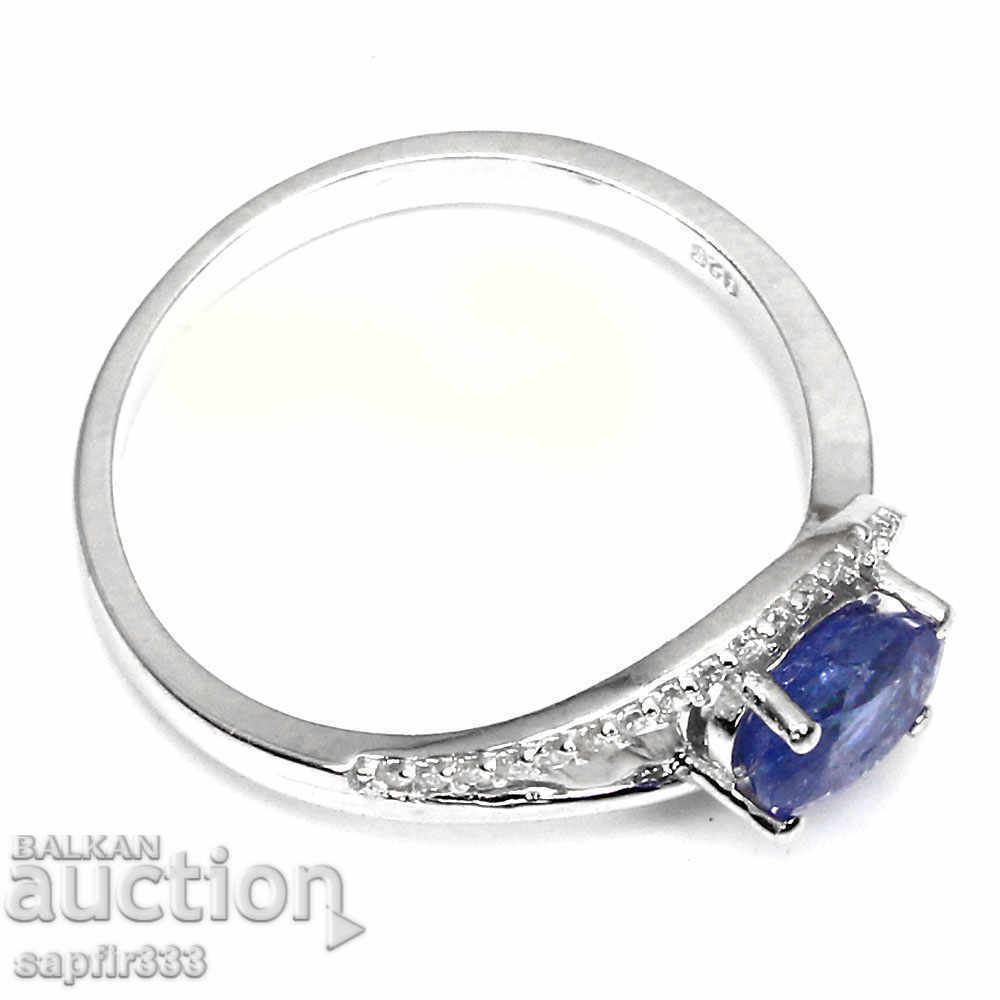 Auction ELEGANT SILVER RING WITH NATURAL TANZANITES AND ZIRCONIA Auction ELEGANT SILVER RING WITH NATURAL TANZANITES AND ZIRCONIA
