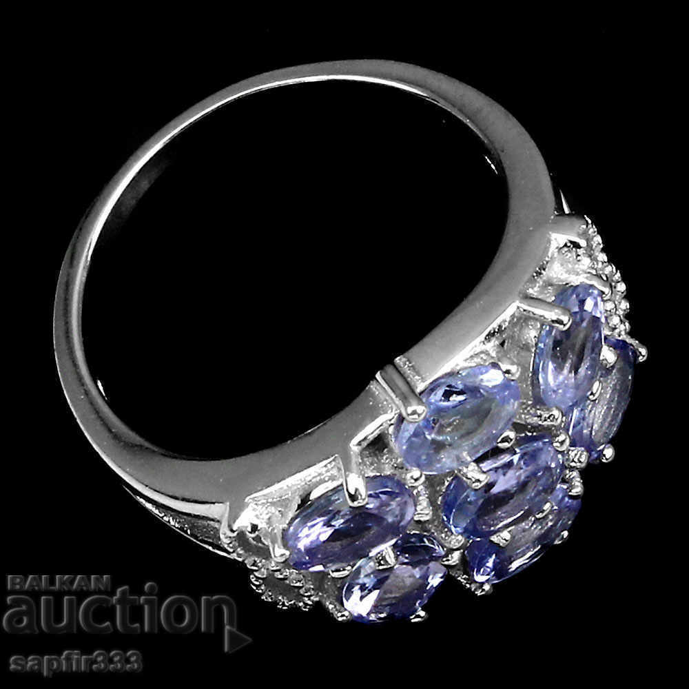 Auction ELEGANT SILVER RING WITH NATURAL TANZANITES Auction ELEGANT SILVER RING WITH NATURAL TANZANITES