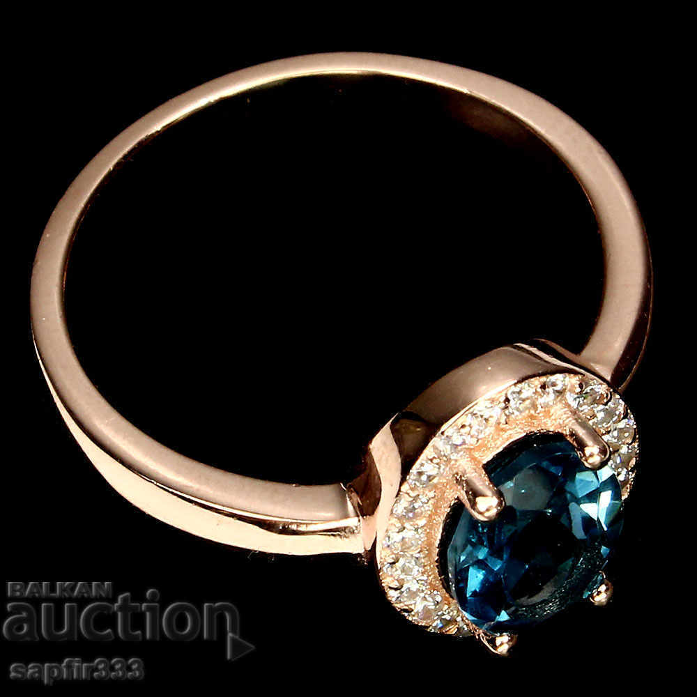 Auction USED SILVER RING WITH NATURAL BLUE TOPAZ AND CYCLONS Auction USED SILVER RING WITH NATURAL BLUE TOPAZ AND CYCLONS