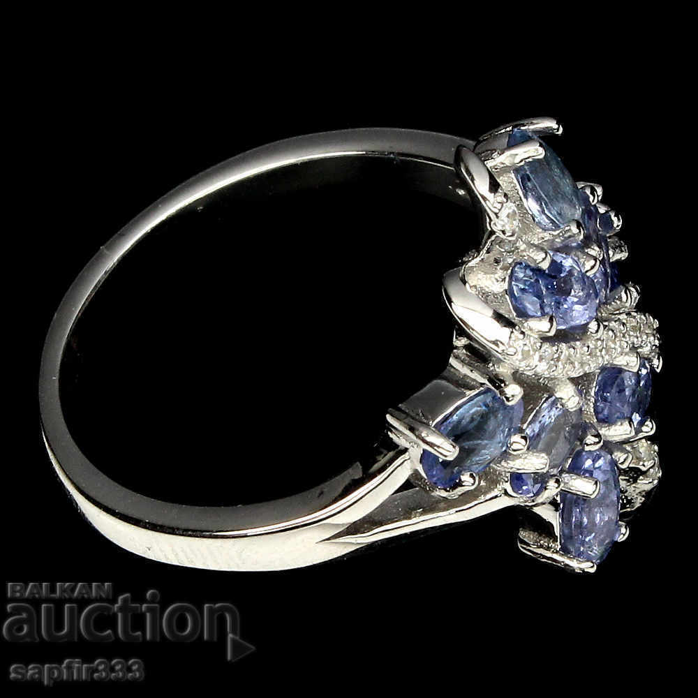 Auction  ELEGANT RING WITH NATURAL TANZANITES AND ZIRCONIA