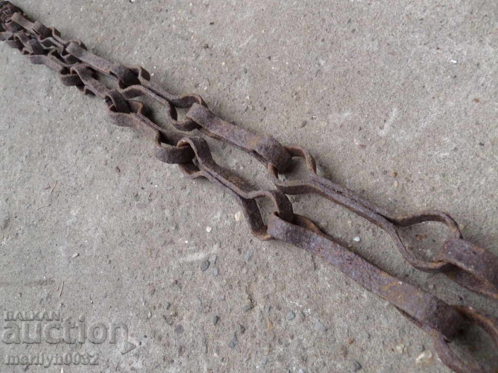 Delivery of Old forged chain with hook, hearth for hearth Delivery of Old forged chain with hook, hearth for hearth