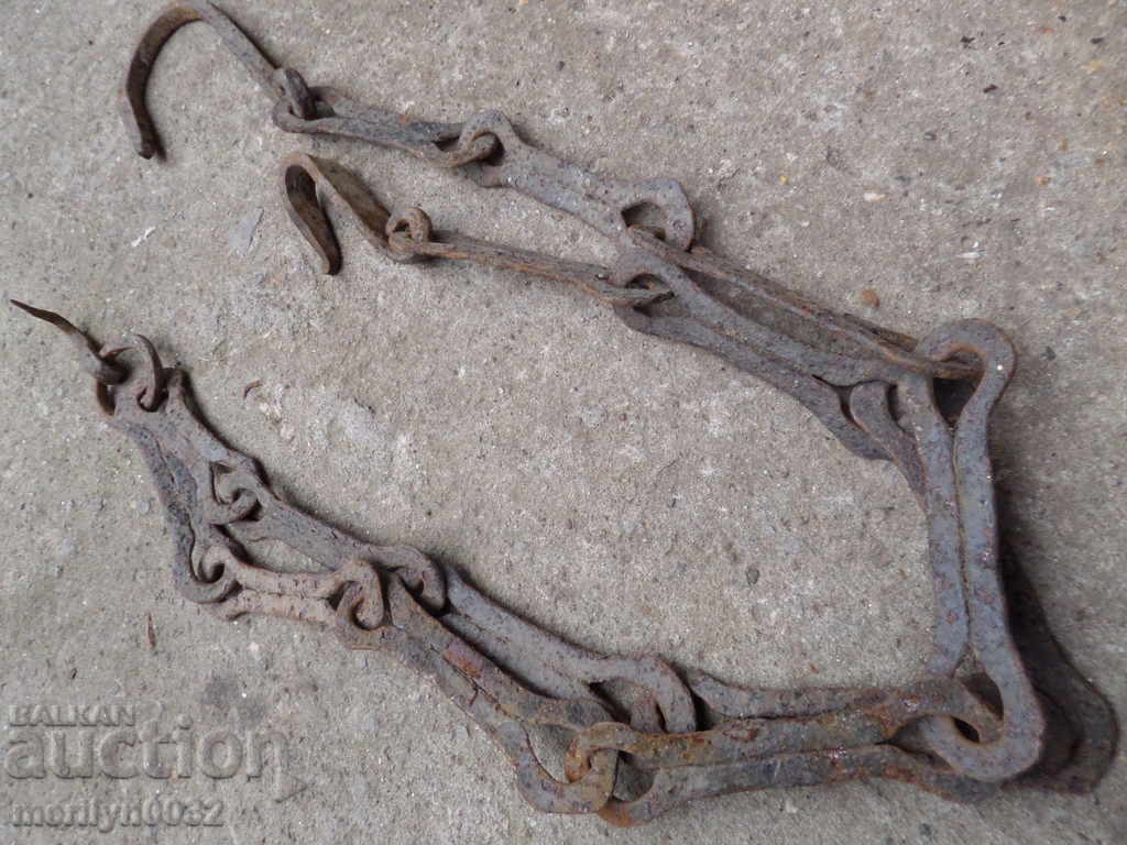 Delivery of Old forged chain with hook, hearth for hearth Delivery of Old forged chain with hook, hearth for hearth