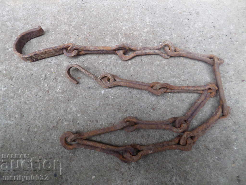 Delivery of Old forged chain with hook, hearth for hearth Delivery of Old forged chain with hook, hearth for hearth