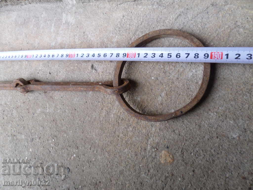 Delivery of Old forged chain with hook, hearth for hearth