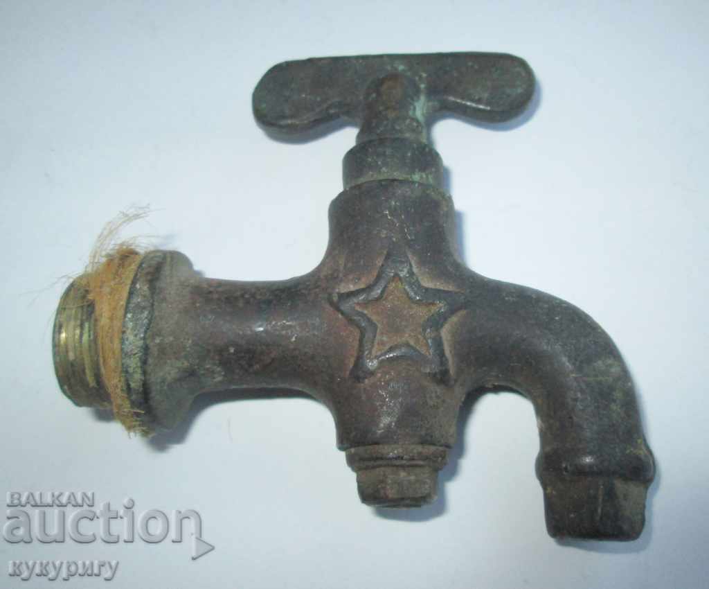 Ancient bronze faucet for fountains France