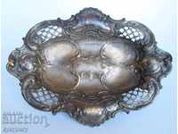 Ancient silver-plated fruit bowl with 19th century ornaments