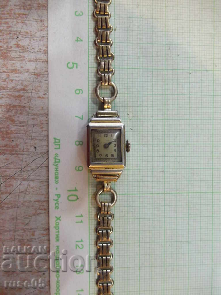 Ladies watch with chain and lid hinges