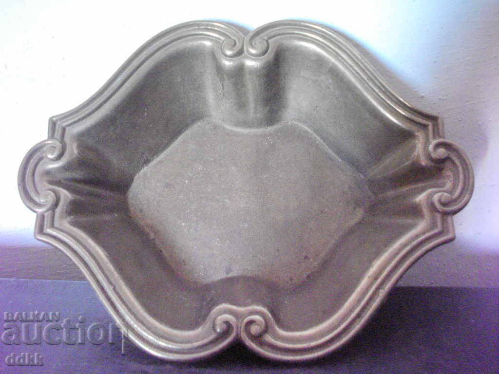 Old bronze candy box with markings