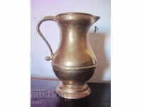 Old bronze jug