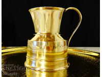 Brass jug for brandy.