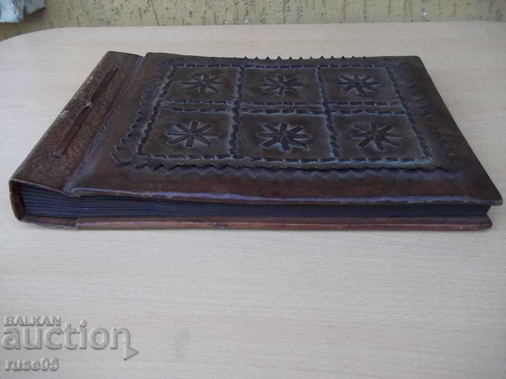 Delivery of A leather album for photos from the UBB store of Sotsia Delivery of A leather album for photos from the UBB store of Sotsia
