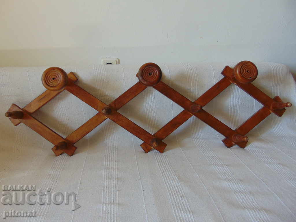 Old folding wooden hanger