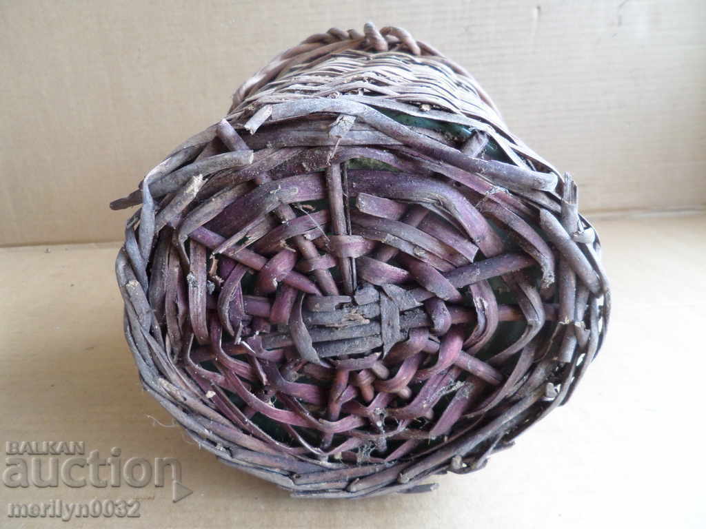 Auction Old rattan jar with a whip wicker bottle Auction Old rattan jar with a whip wicker bottle
