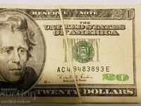 A very rare $20 bill with a printing defect