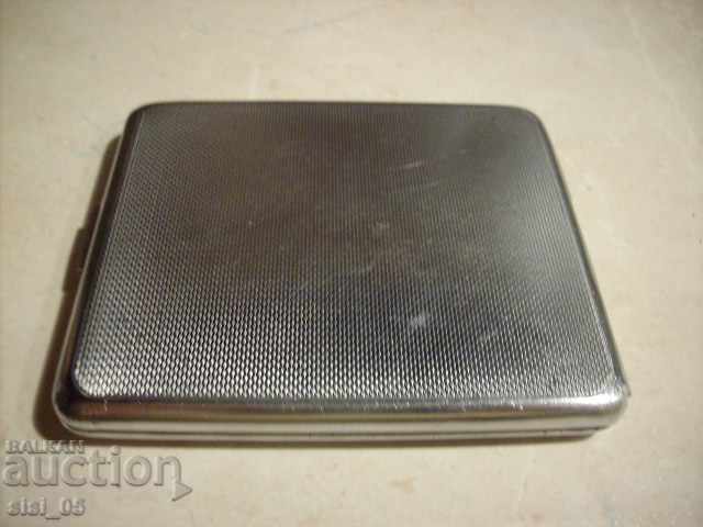 Auction An old metal engraved cigarette case Auction An old metal engraved cigarette case