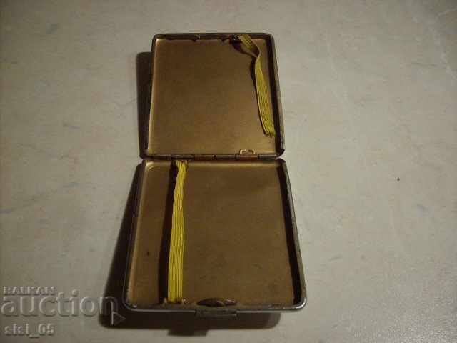 Delivery of An old metal engraved cigarette case Delivery of An old metal engraved cigarette case