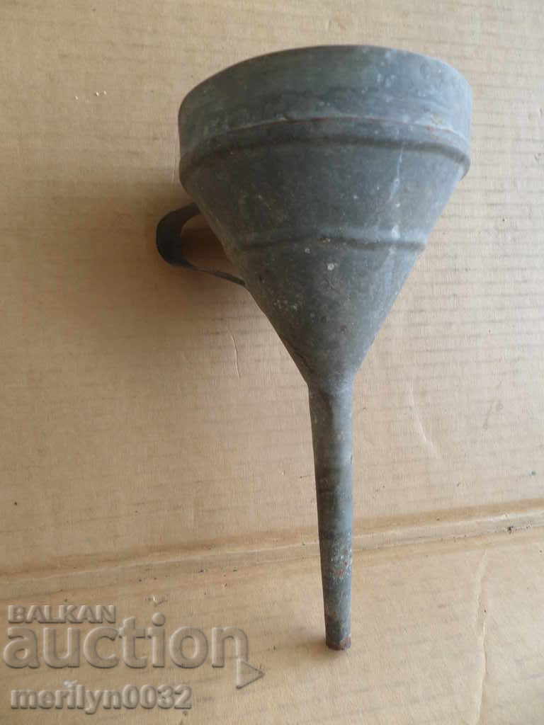 An old funnel for fueling