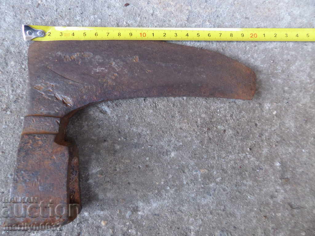 Auction An old ax ax with a pressed toothed saber hat Auction An old ax ax with a pressed toothed saber hat